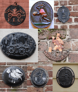 Fire markers on various Charleston buildings. 